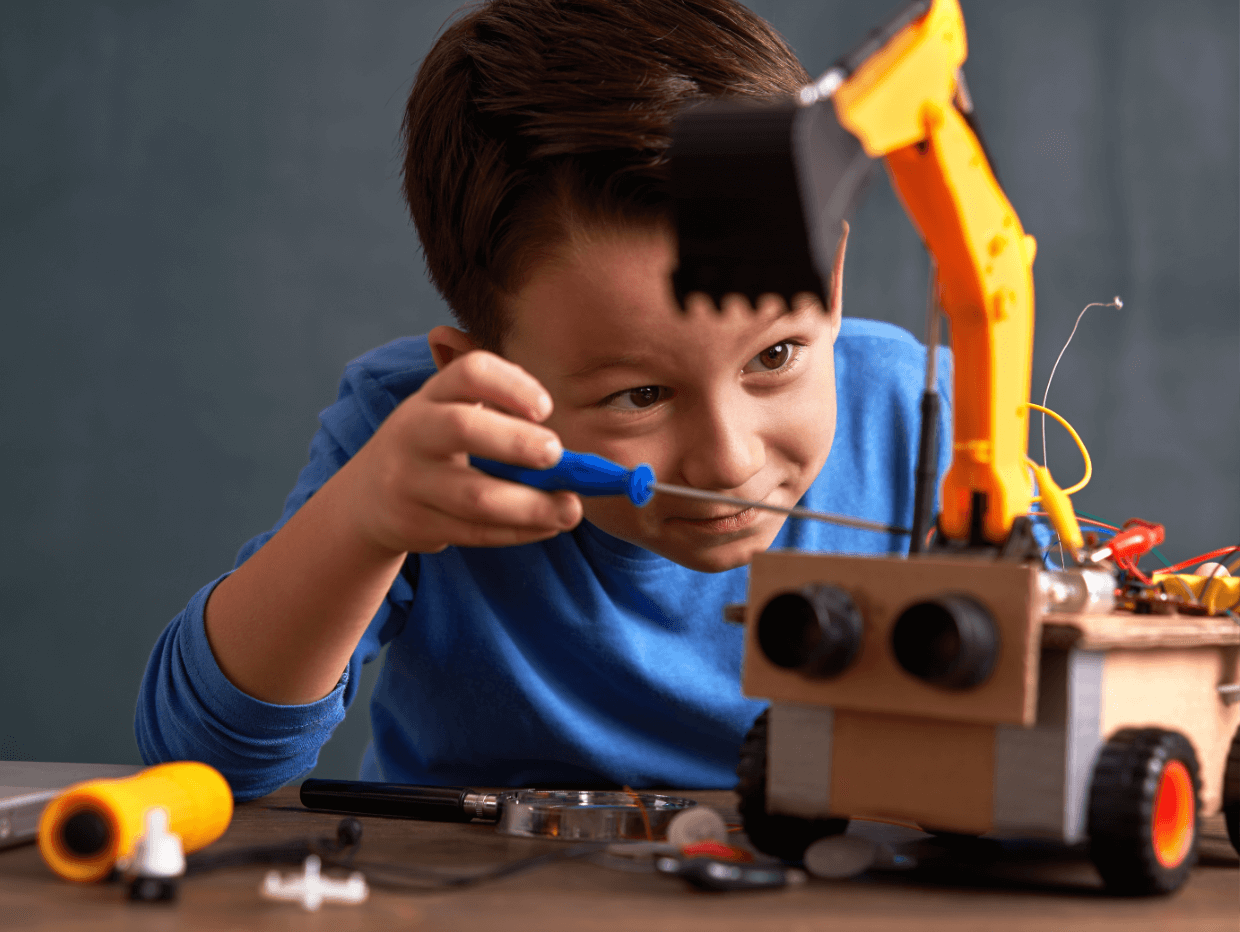 boy building an excavator